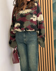 Pullover minetic con zip